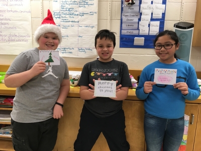 Students spread joy and cheer with cards to celebrate Advent!